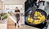 Ett ljust kök, en person står vid diskhon och en panna med stekt gnocchi och salvia.