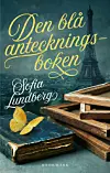 Bokomslag med texten Den blå anteckningsboken, Sofia Lundberg, Eiffeltornet, en gul fjäril och trälådor.