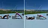 To personer laver pushups ved en hvid kasse på en udendørs bane i solskin.